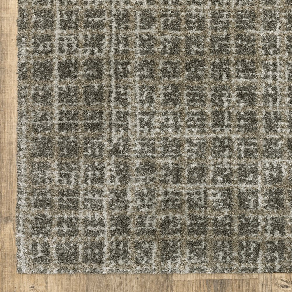 5' X 8' Brown And Beige Geometric Distressed Area Rug