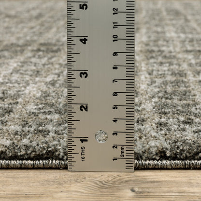 5' X 8' Brown And Beige Geometric Distressed Area Rug