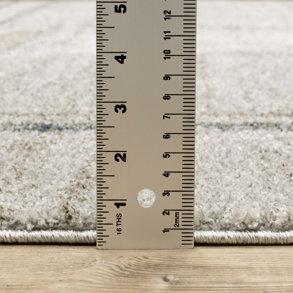 8' Beige And Blue Geometric Distressed Runner Rug