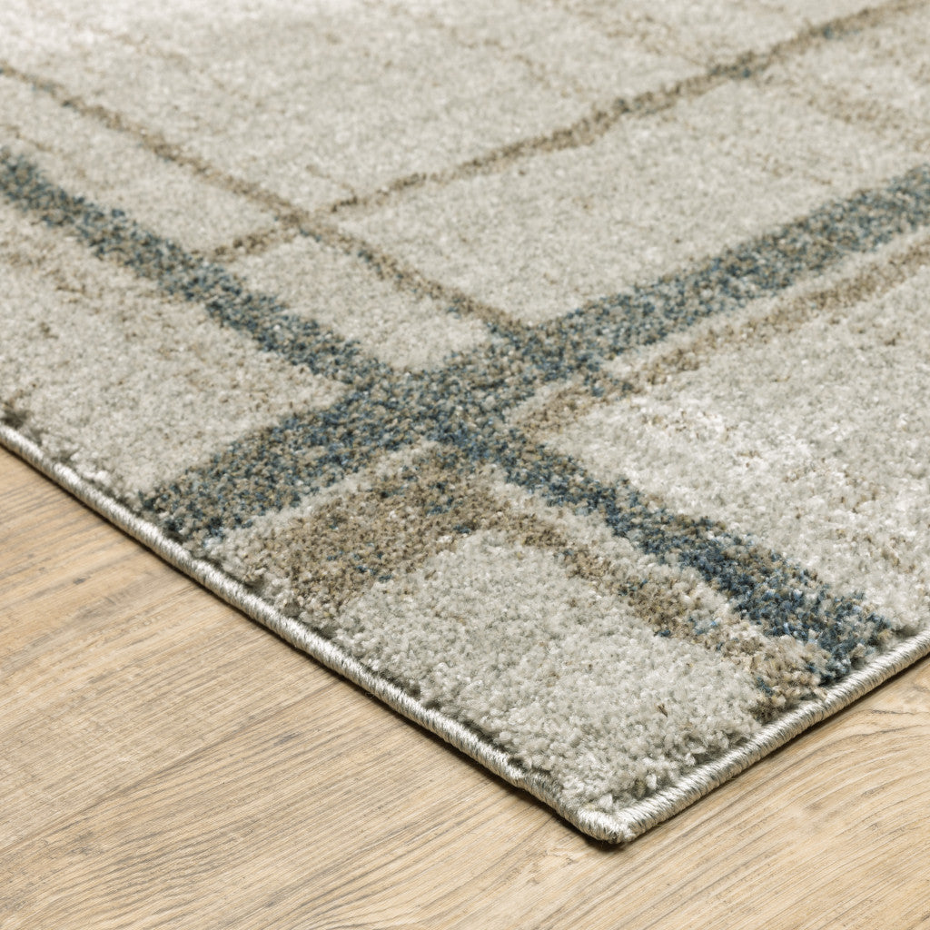 5' X 8' Grey Teal Beige and Tan Geometric Power Loom Area Rug