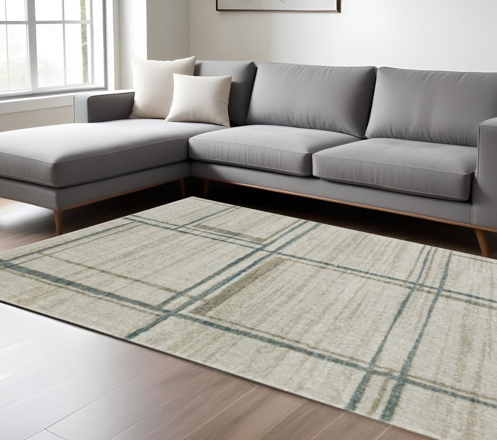 7' X 10' Grey Teal Beige and Tan Geometric Power Loom Area Rug