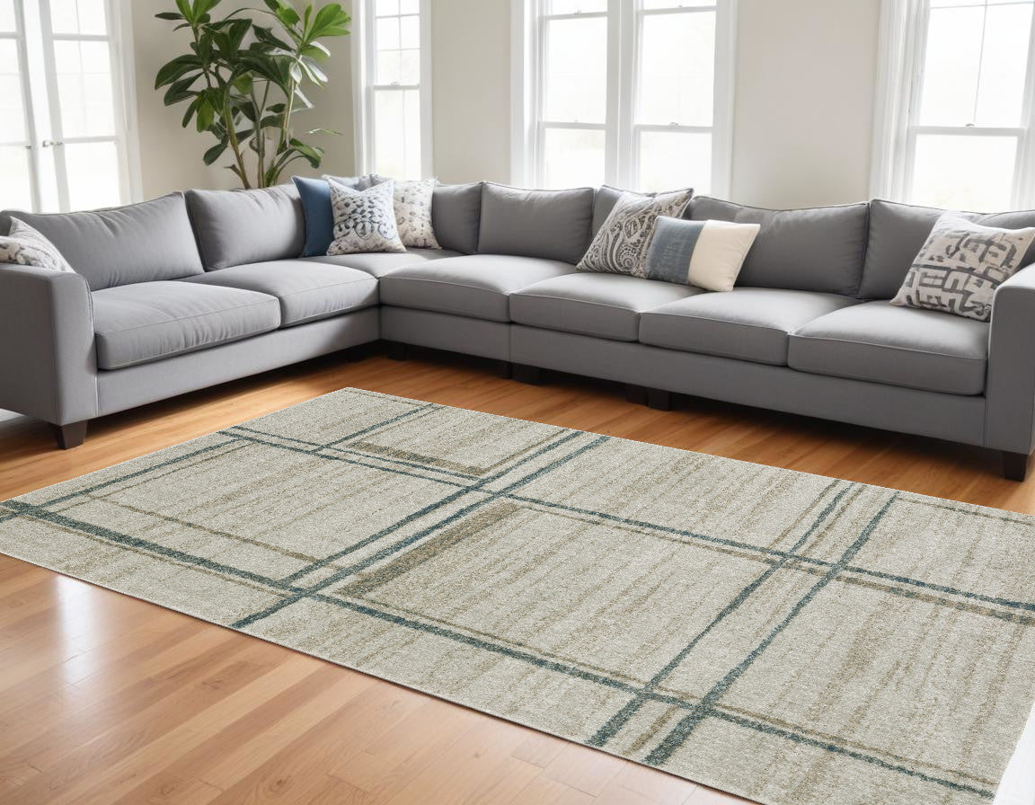 7' X 10' Grey Teal Beige and Tan Geometric Power Loom Area Rug