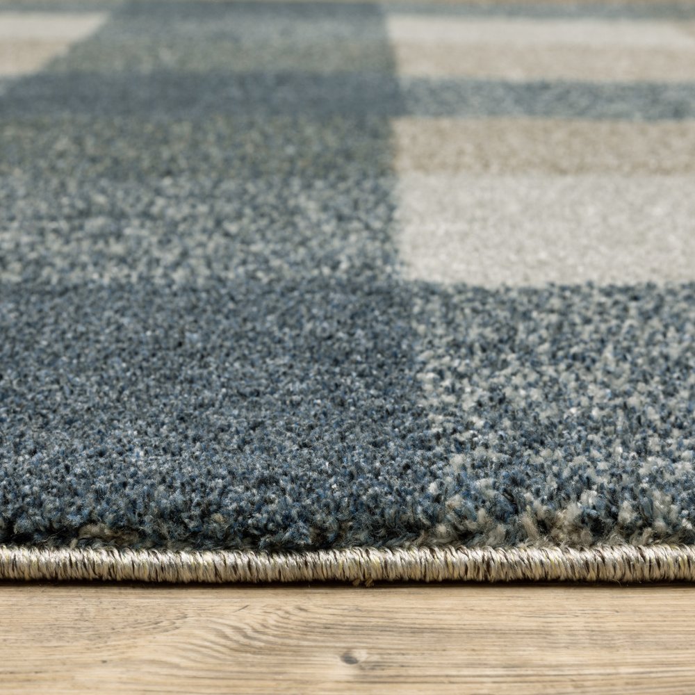 5' X 8' Tan and Gray Geometric Power Loom Area Rug
