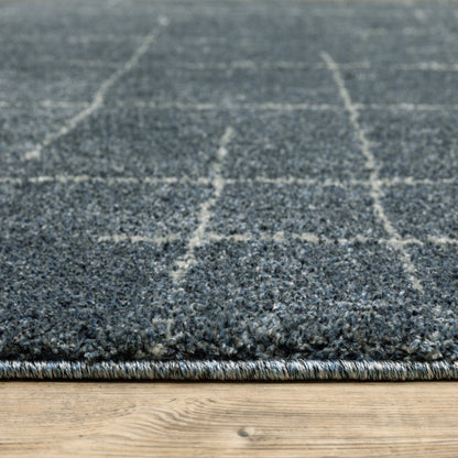 3' X 5' Blue And Beige Geometric Distressed Area Rug