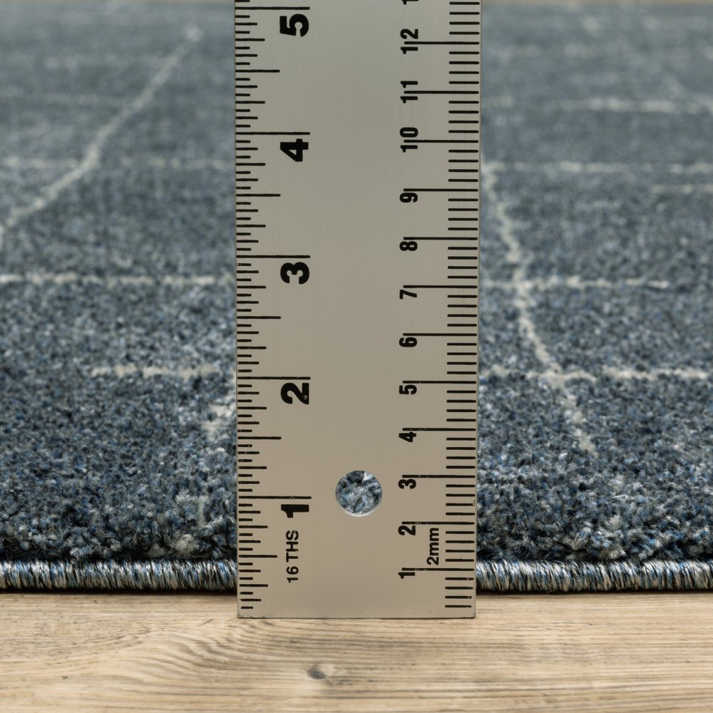 3' X 5' Blue And Beige Geometric Distressed Area Rug