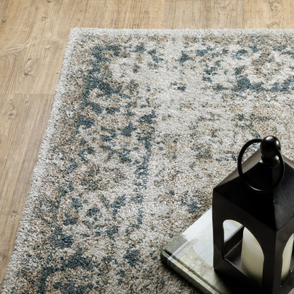 5' X 8' Beige And Blue Oriental Distressed Area Rug