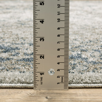 5' X 8' Beige And Blue Oriental Distressed Area Rug