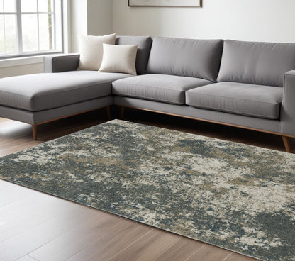 7' X 10' Tan and Gray Abstract Power Loom Area Rug