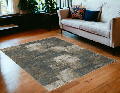 5' X 8' Teal Blue Geometric Power Loom Area Rug