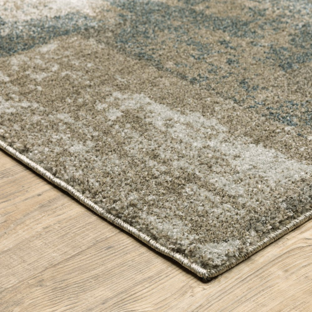 5' X 8' Teal Blue Geometric Power Loom Area Rug
