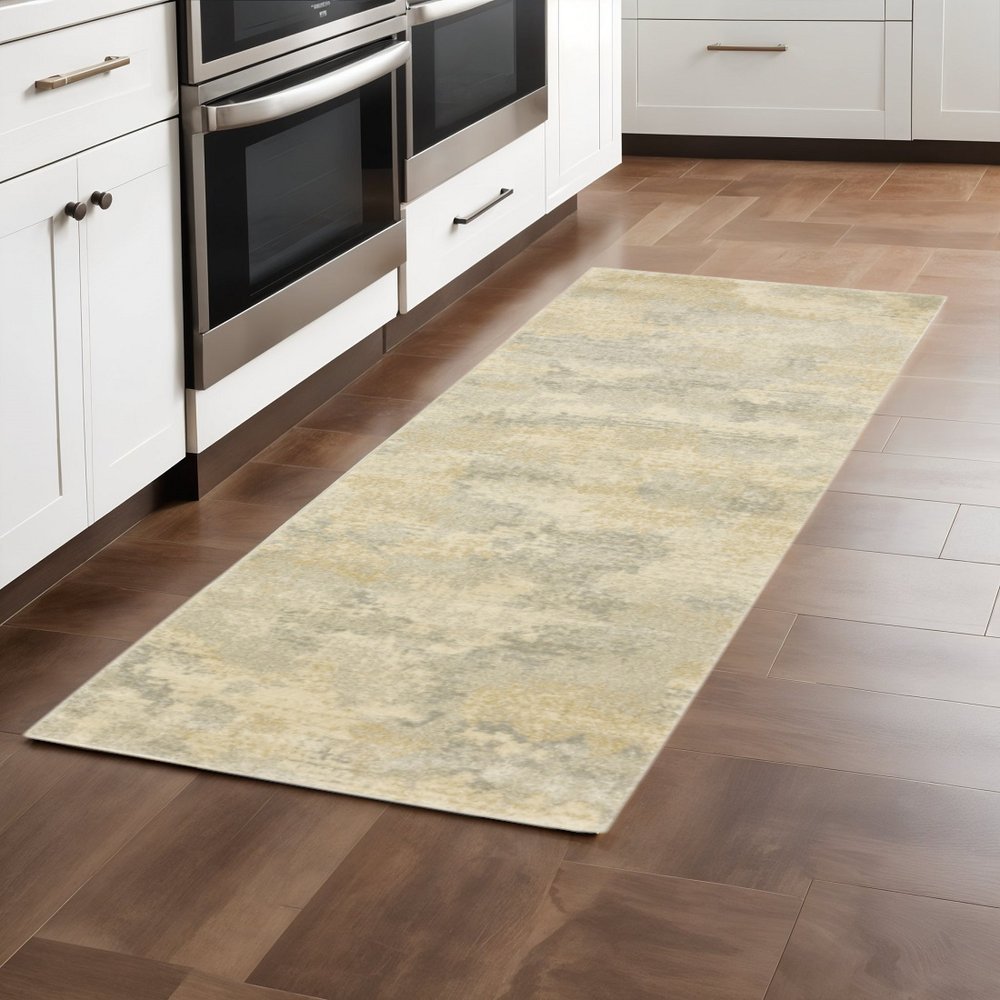 2' X 8' Grey Ivory Beige And Taupe Abstract Power Loom Stain Resistant Runner Rug