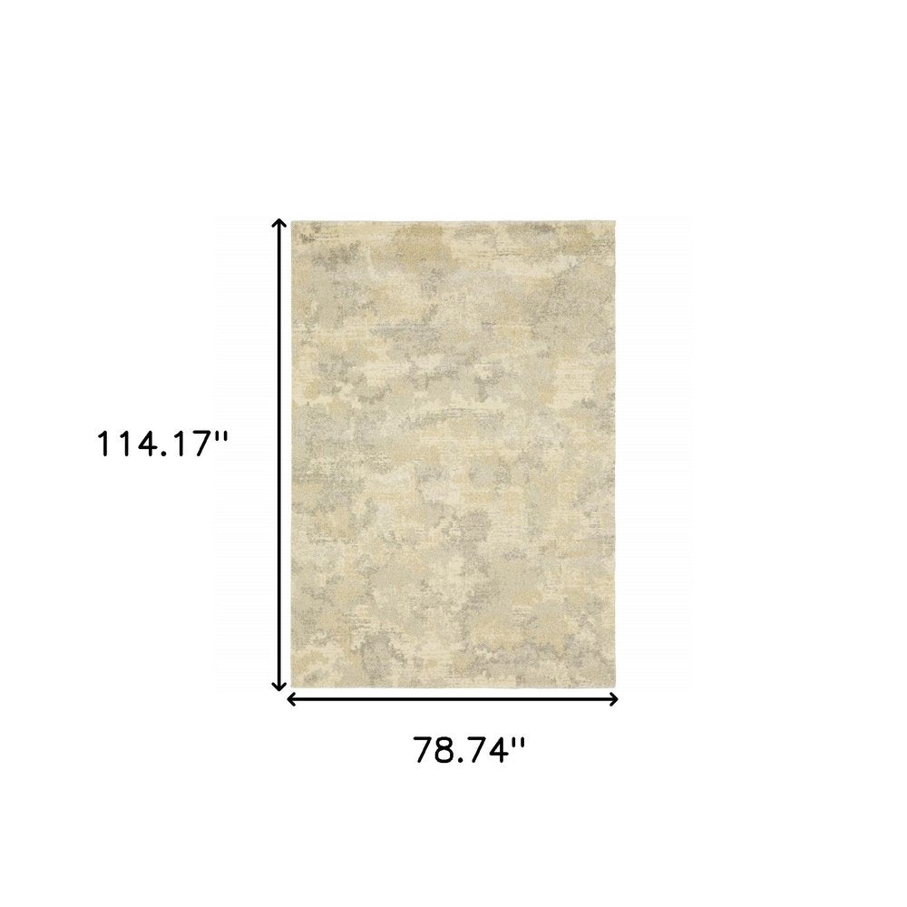 6' X 9' Grey Ivory Beige And Taupe Abstract Power Loom Stain Resistant Area Rug