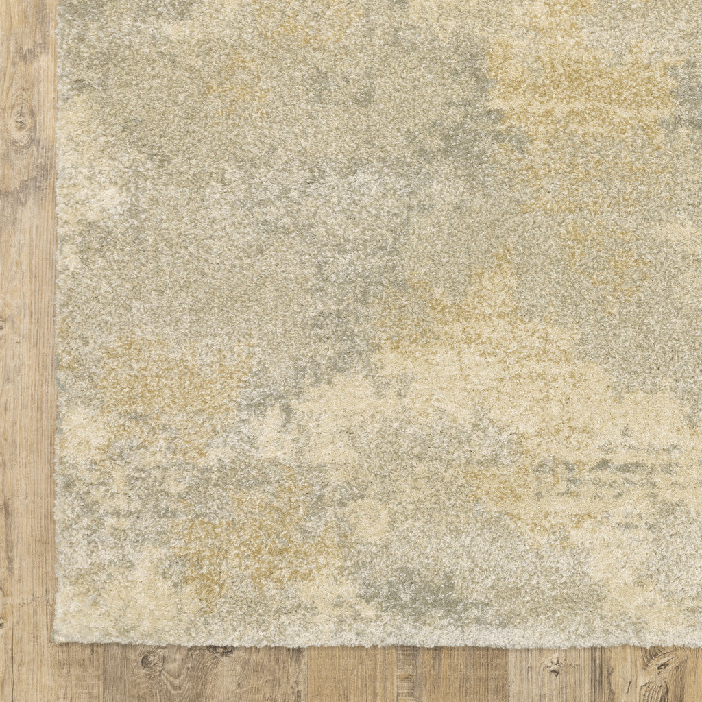 8' X 11' Grey Ivory Beige And Taupe Abstract Power Loom Stain Resistant Area Rug