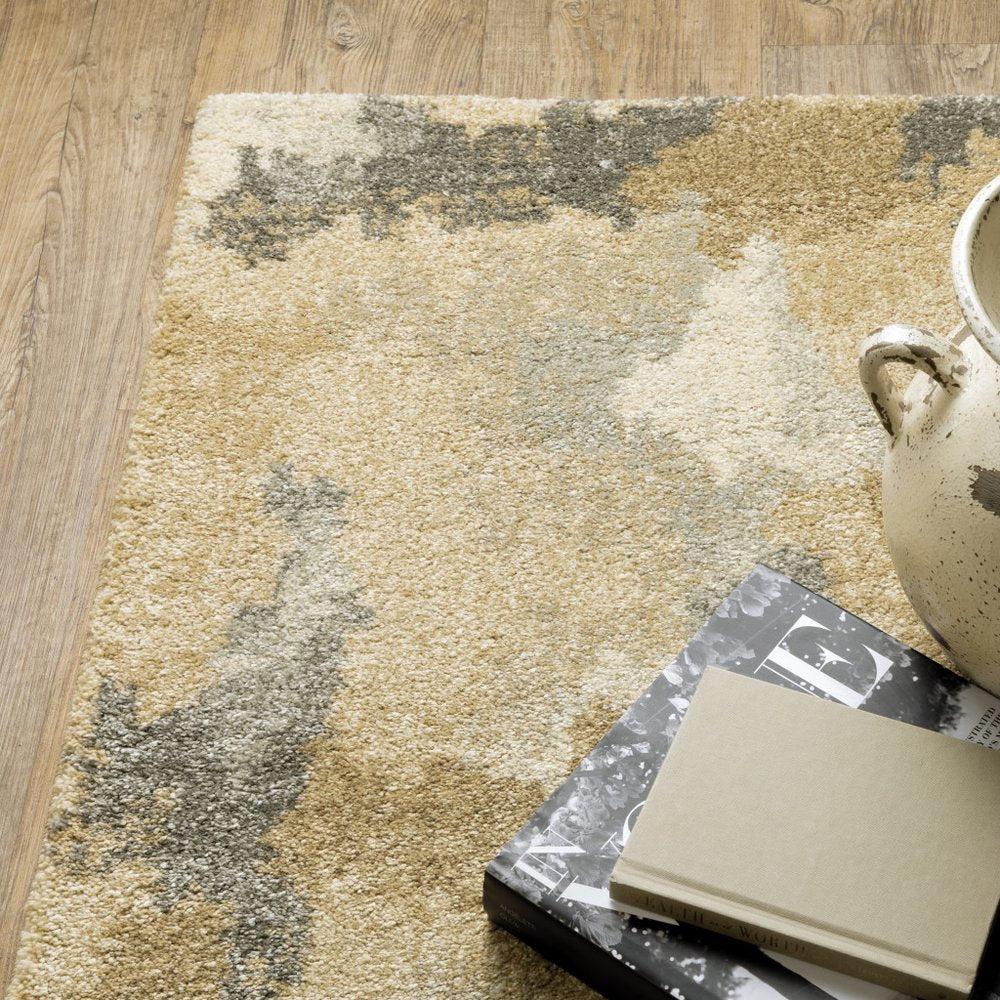 10' X 13' Beige And Gold Abstract Area Rug