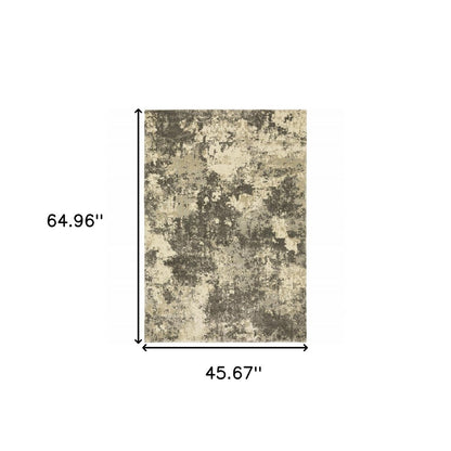 3' X 5' Charcoal Grey Beige And Tan Abstract Power Loom Stain Resistant Area Rug