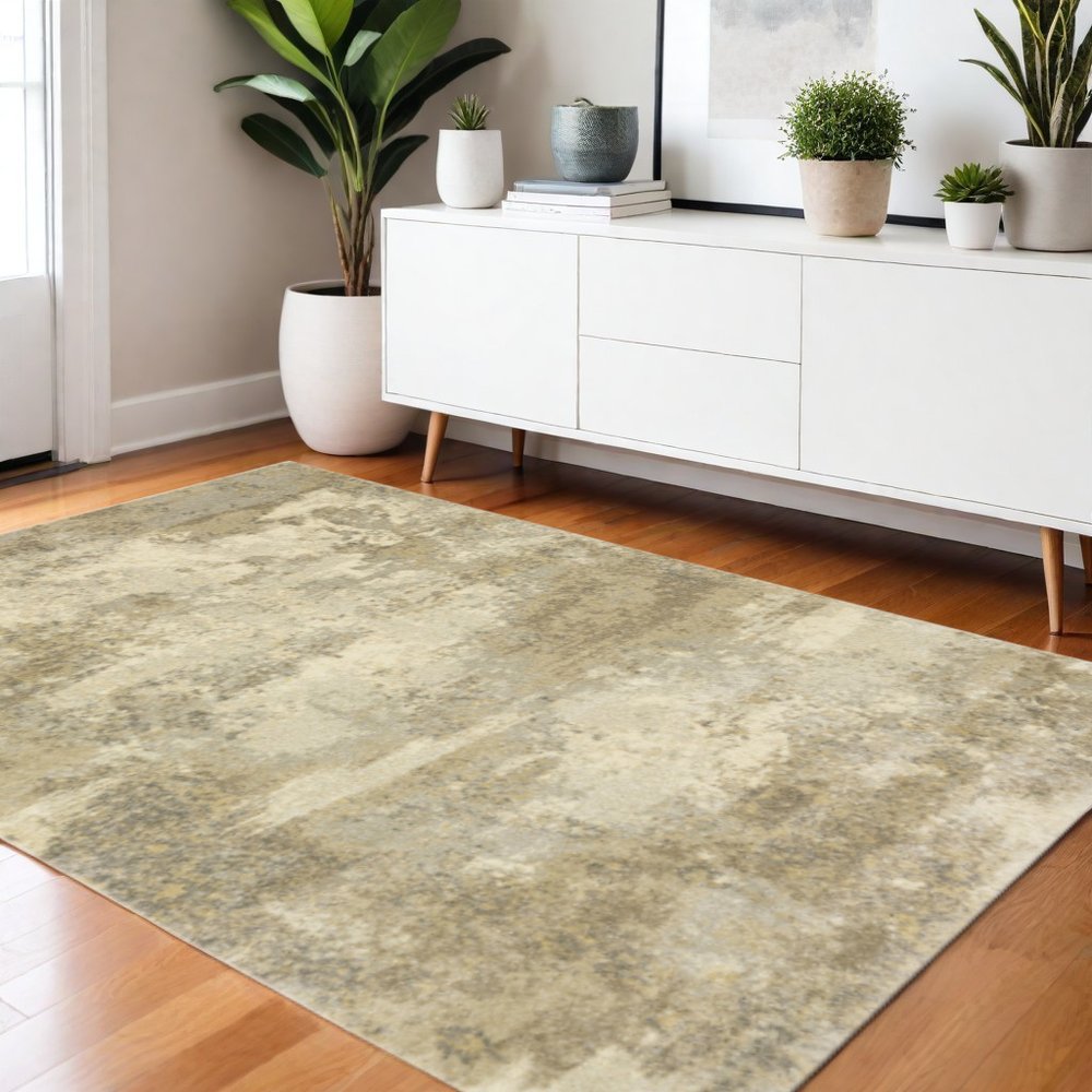 4' X 5' Beige and Gold Abstract Power Loom Area Rug