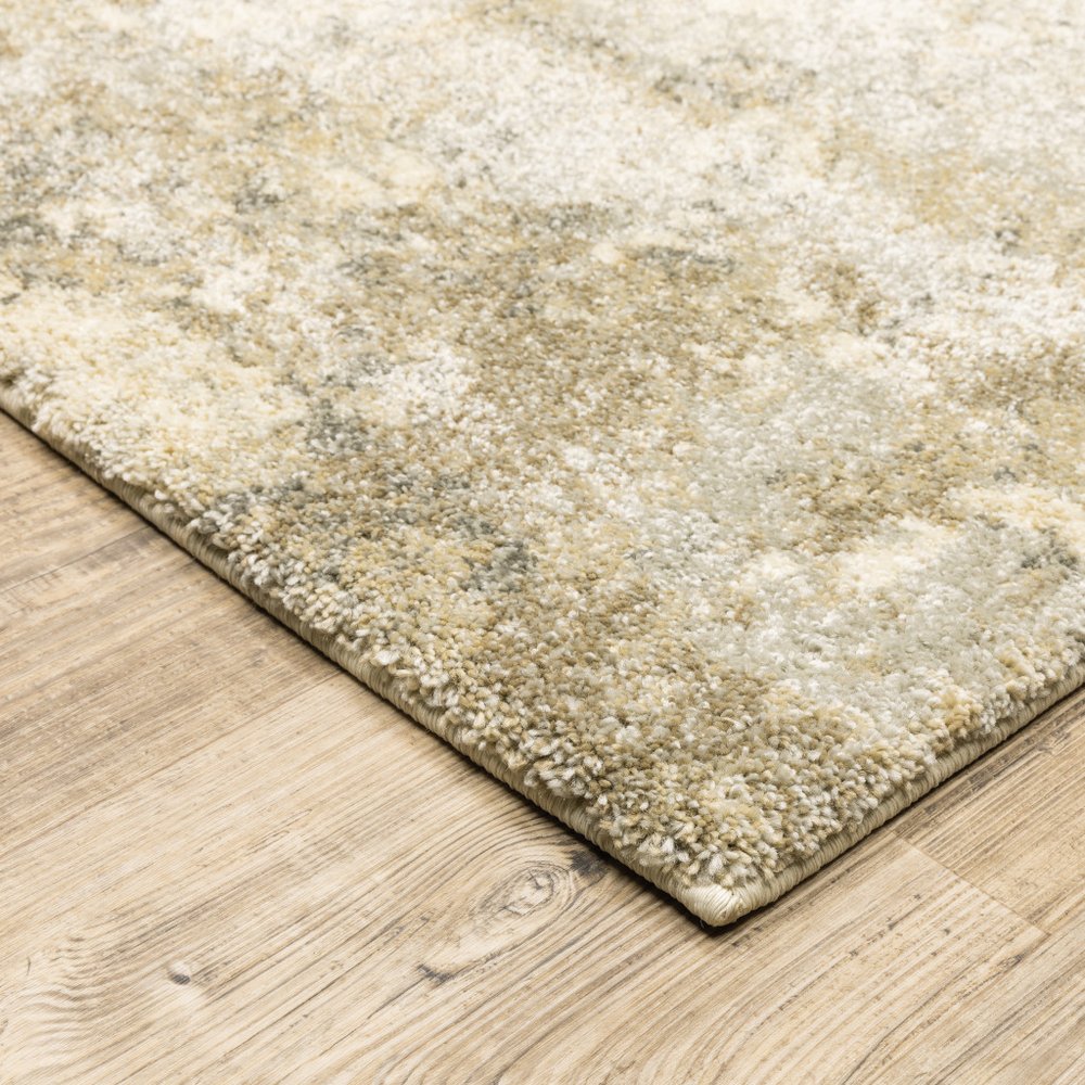4' X 5' Beige and Gold Abstract Power Loom Area Rug