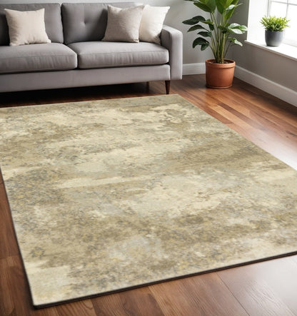 5' X 8' Beige and Gold Abstract Power Loom Area Rug