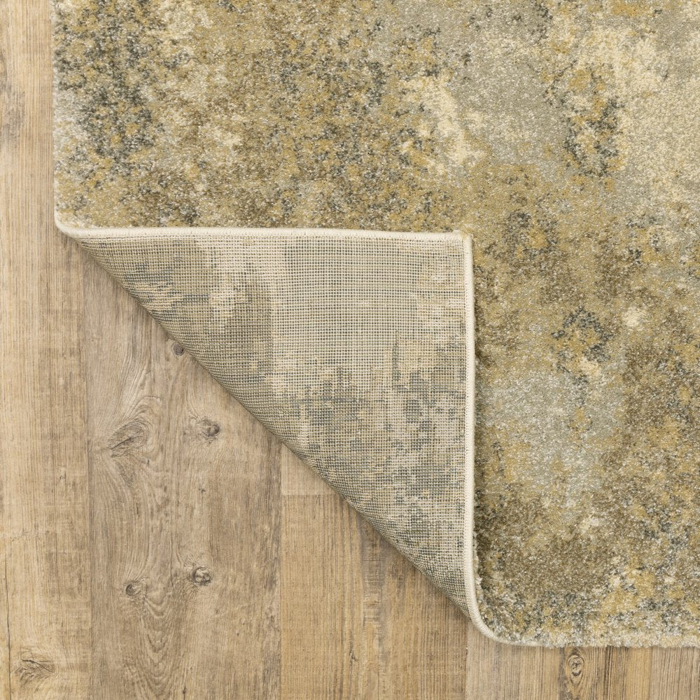 5' X 8' Beige and Gold Abstract Power Loom Area Rug