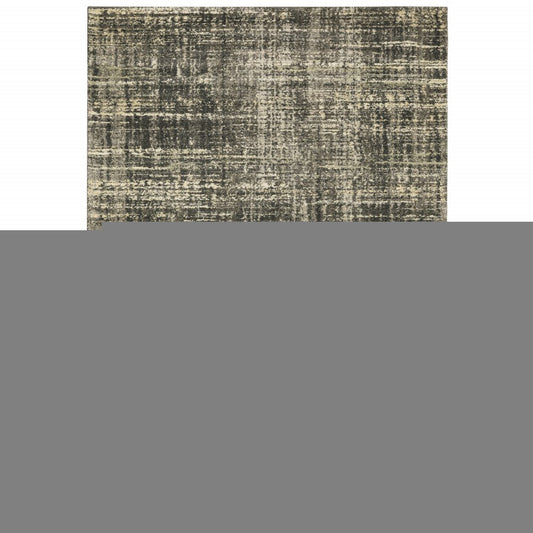 8' X 11' Charcoal Grey Beige And Tan Abstract Power Loom Stain Resistant Area Rug