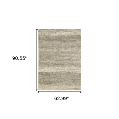 5' X 8' Grey Beige And Tan Abstract Power Loom Stain Resistant Area Rug