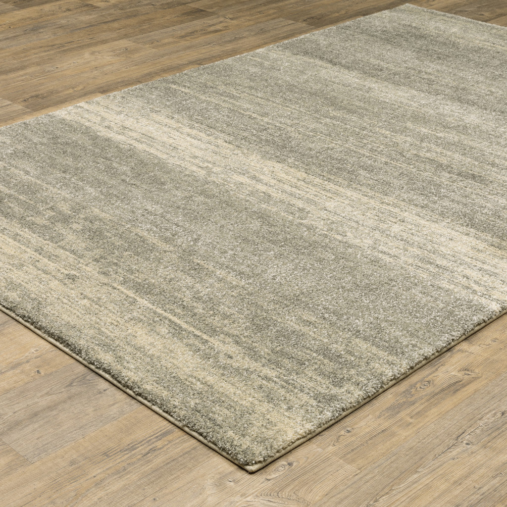 6' X 9' Grey Beige And Tan Abstract Power Loom Stain Resistant Area Rug