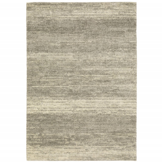 8' X 11' Grey Beige And Tan Abstract Power Loom Stain Resistant Area Rug