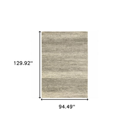 8' X 11' Grey Beige And Tan Abstract Power Loom Stain Resistant Area Rug