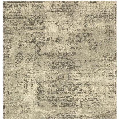 3' X 5' Grey Ivory Beige And Taupe Oriental Power Loom Stain Resistant Area Rug
