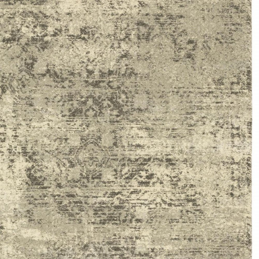 5' X 8' Grey Ivory Beige And Taupe Oriental Power Loom Stain Resistant Area Rug