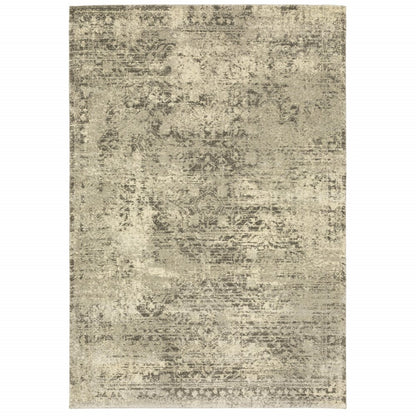 6' X 9' Grey Ivory Beige And Taupe Oriental Power Loom Stain Resistant Area Rug