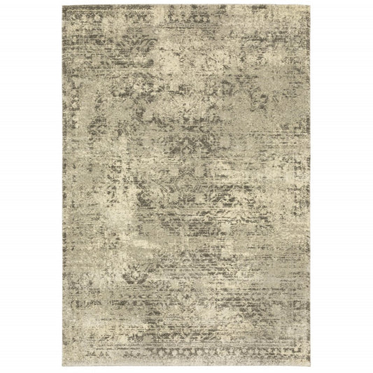 6' X 9' Grey Ivory Beige And Taupe Oriental Power Loom Stain Resistant Area Rug