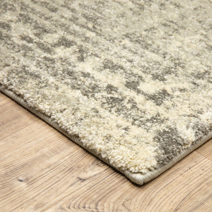 6' X 9' Grey Ivory Beige And Taupe Oriental Power Loom Stain Resistant Area Rug