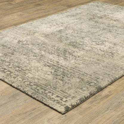 6' X 9' Grey Ivory Beige And Taupe Oriental Power Loom Stain Resistant Area Rug