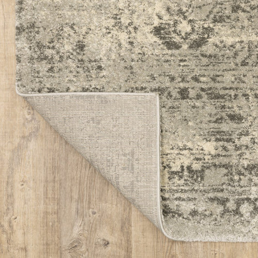 6' X 9' Grey Ivory Beige And Taupe Oriental Power Loom Stain Resistant Area Rug