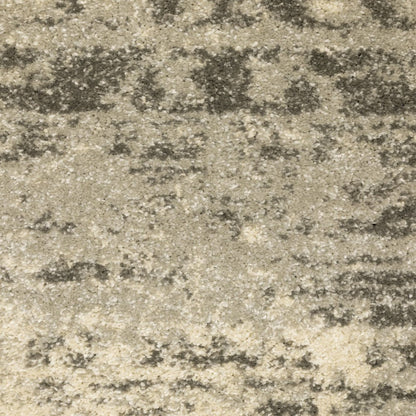 6' X 9' Grey Ivory Beige And Taupe Oriental Power Loom Stain Resistant Area Rug