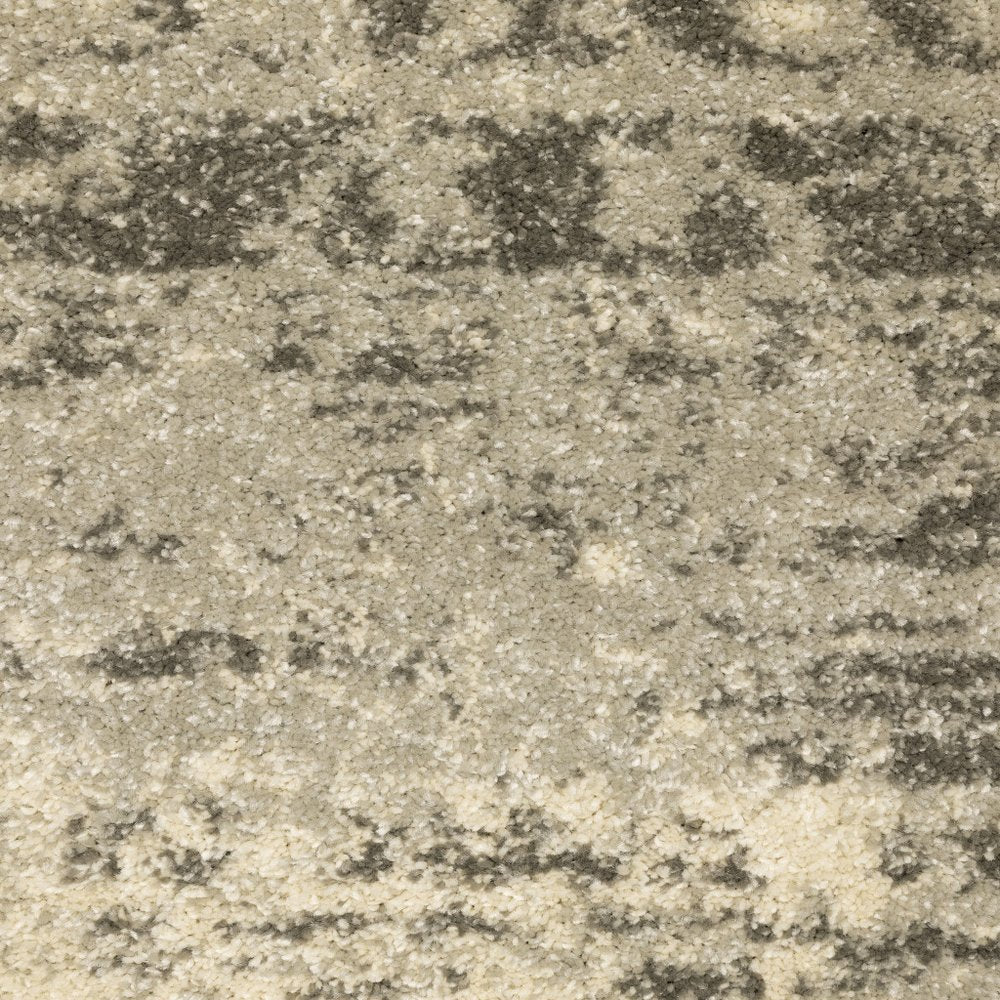 6' X 9' Grey Ivory Beige And Taupe Oriental Power Loom Stain Resistant Area Rug