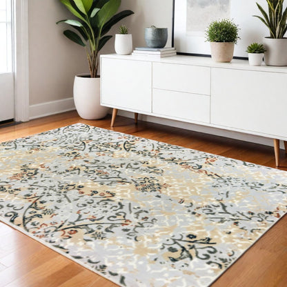 4' X 6' Grey And Gold Abstract Power Loom Stain Resistant Area Rug