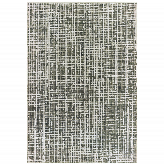 5' X 8' Grey And Ivory Abstract Power Loom Stain Resistant Area Rug