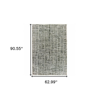 5' X 8' Grey And Ivory Abstract Power Loom Stain Resistant Area Rug