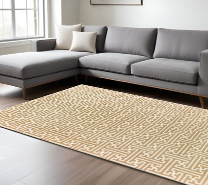 7' X 10' Gold And Ivory Geometric Area Rug