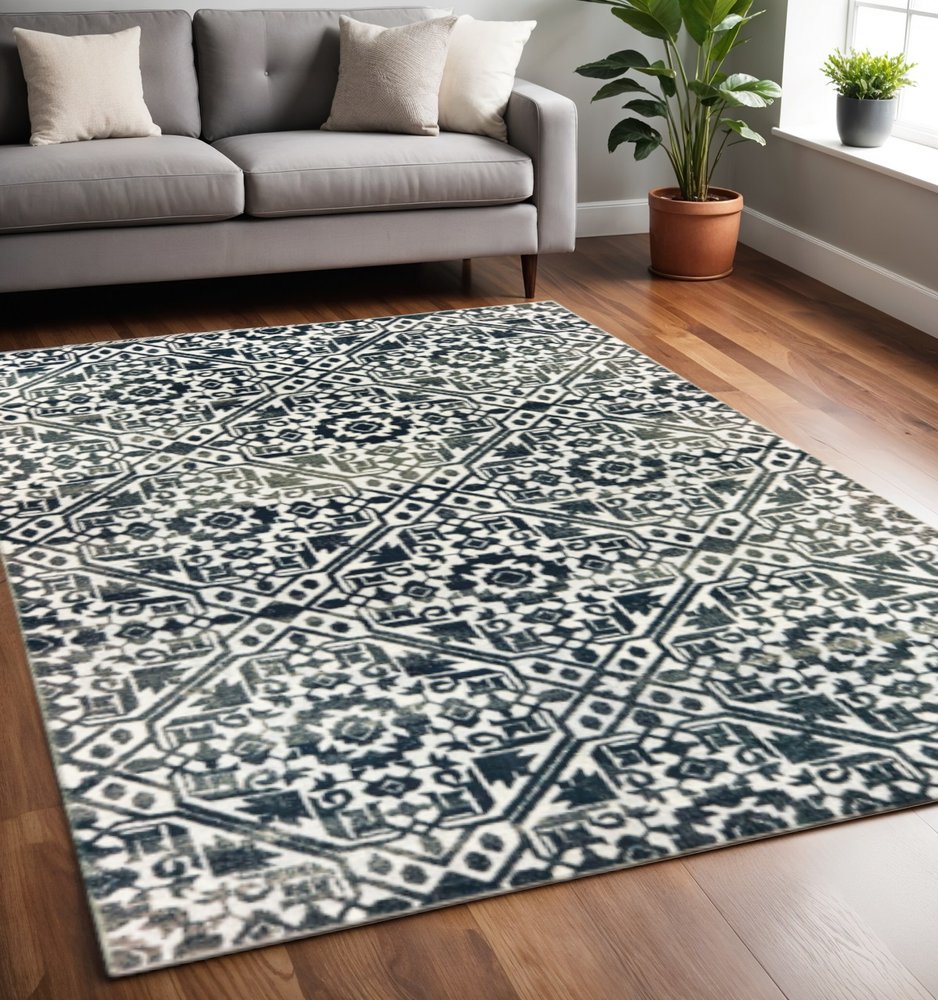 5' X 8' Navy And Ivory Geometric Power Loom Stain Resistant Area Rug