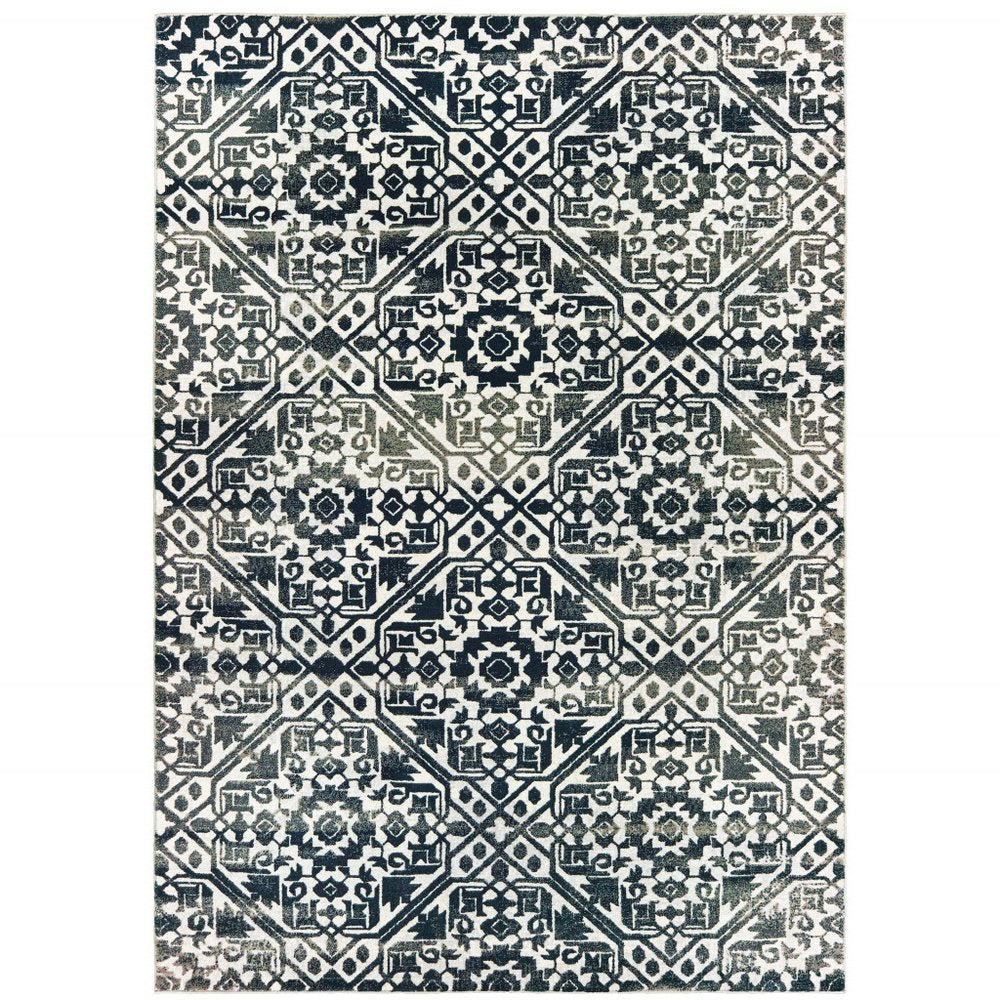 7' X 10' Navy Blue And Ivory Geometric Distressed Area Rug
