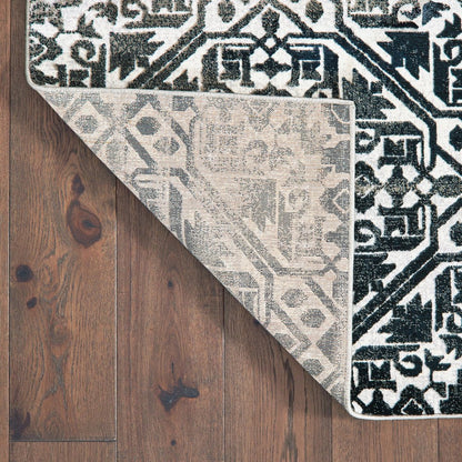 7' X 10' Navy Blue And Ivory Geometric Distressed Area Rug