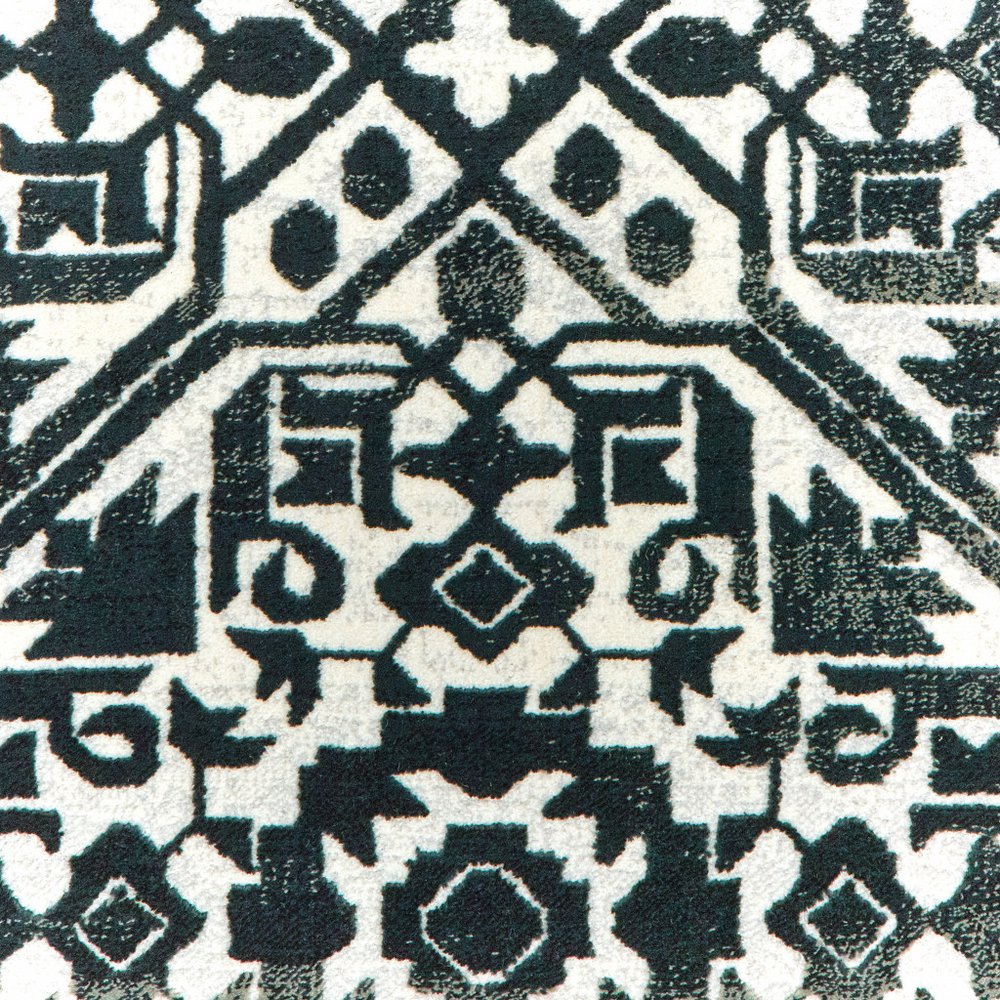 7' X 10' Navy Blue And Ivory Geometric Distressed Area Rug