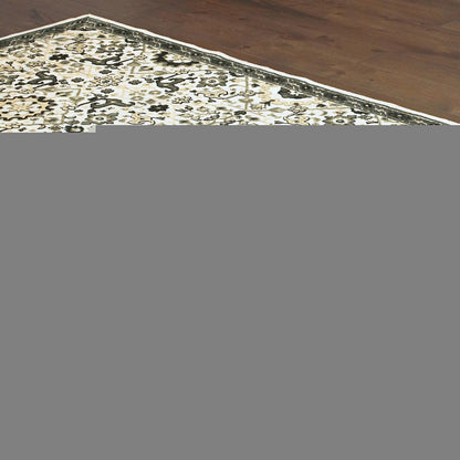 4' X 6' Ivory Navy And Gold Oriental Power Loom Stain Resistant Area Rug