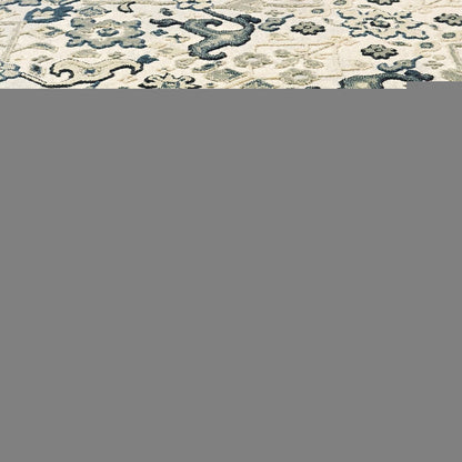 5' X 8' Ivory Navy And Gold Oriental Power Loom Stain Resistant Area Rug