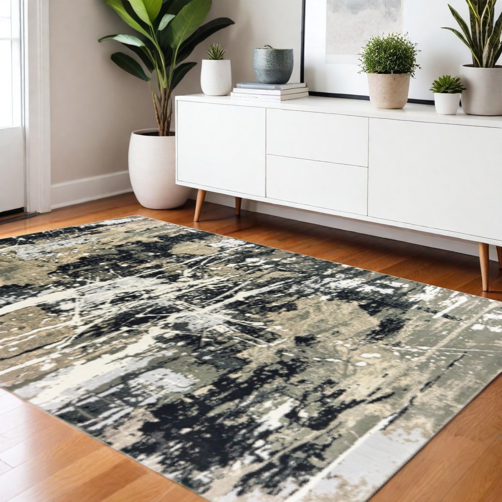 4' X 6' Black Gold Grey And Ivory Abstract Power Loom Stain Resistant Area Rug