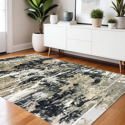 4' X 6' Black Gold Grey And Ivory Abstract Power Loom Stain Resistant Area Rug