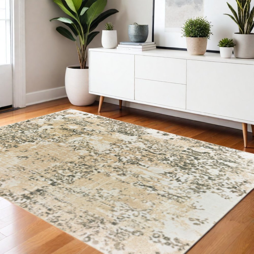 4' X 6' Grey And Gold Abstract Power Loom Stain Resistant Area Rug